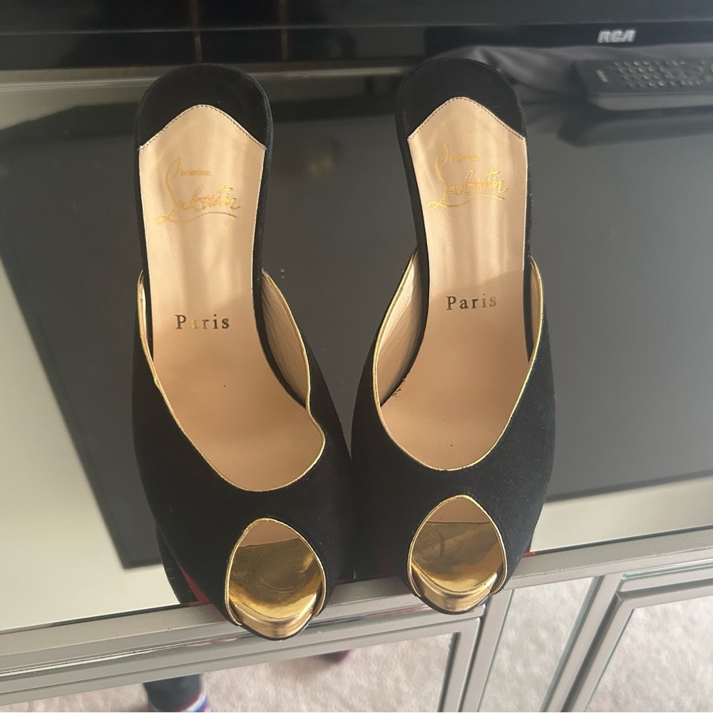 - Christian Louboutin Sz. 7
